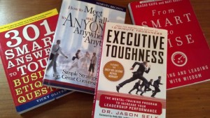 Four business related books by publicist Cathy Lewis.