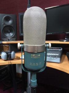 A microphone in a radio station before an author interview.